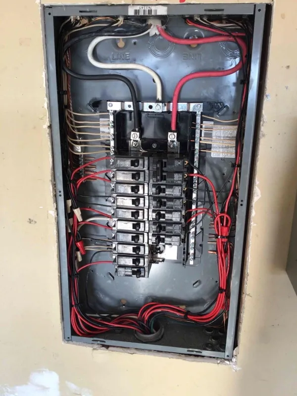 An indoor electrical panel upgrade.