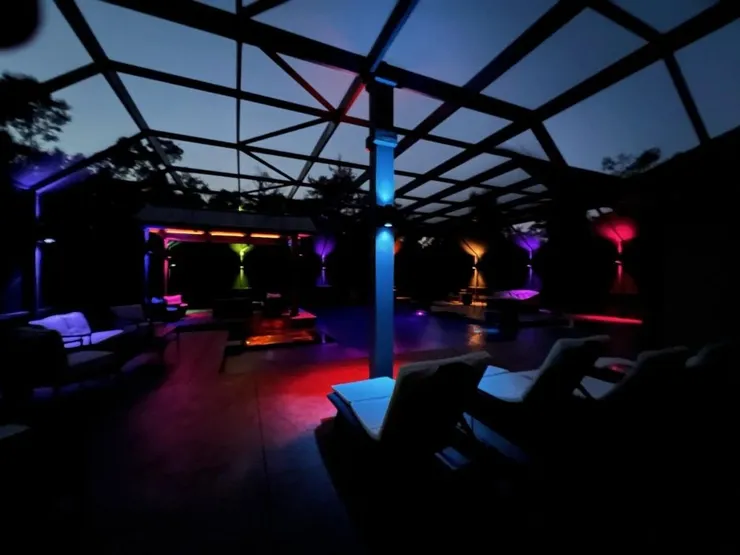 Color changing pool enclosure lighting at a home in Pensacola, FL.