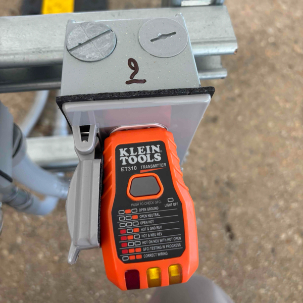 Receptacle tester plugged into an outdoor receptacle and indicating correct wiring.