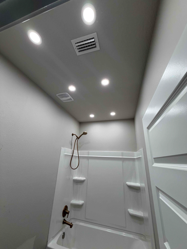 Wafer lighting in bathroom.