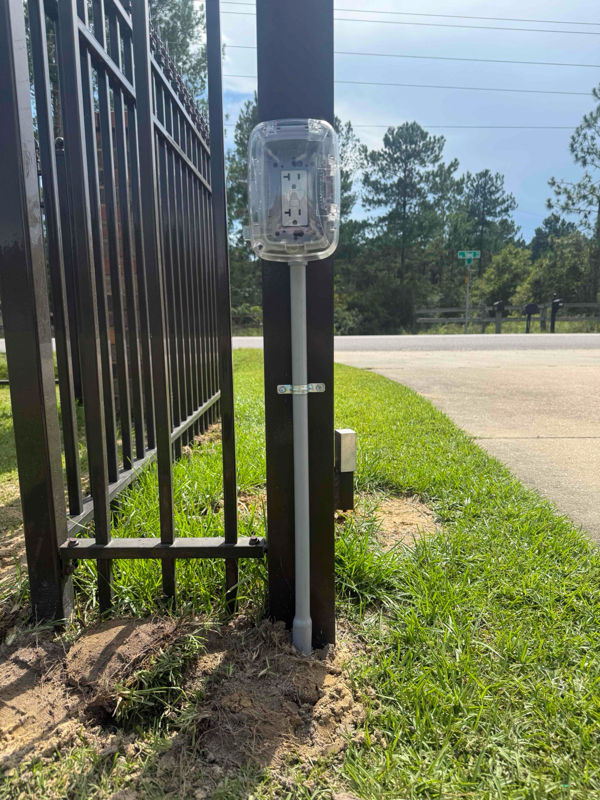 Outside GFCI receptacle in weather resistant in use cover.